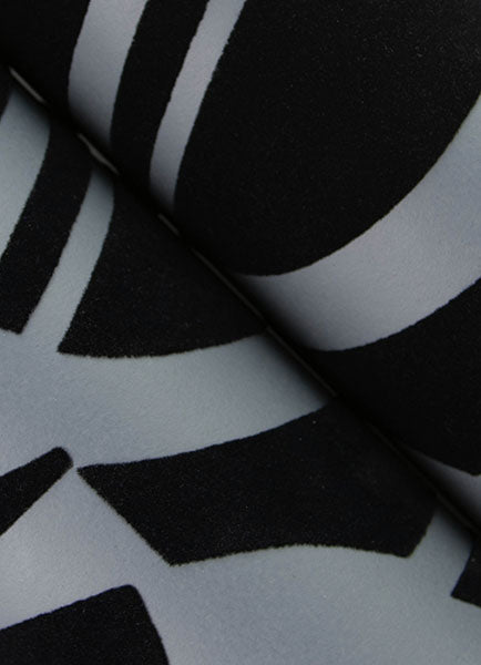 Eade’s Carter Black Geometric Flock Wallpaper by Scott Livin