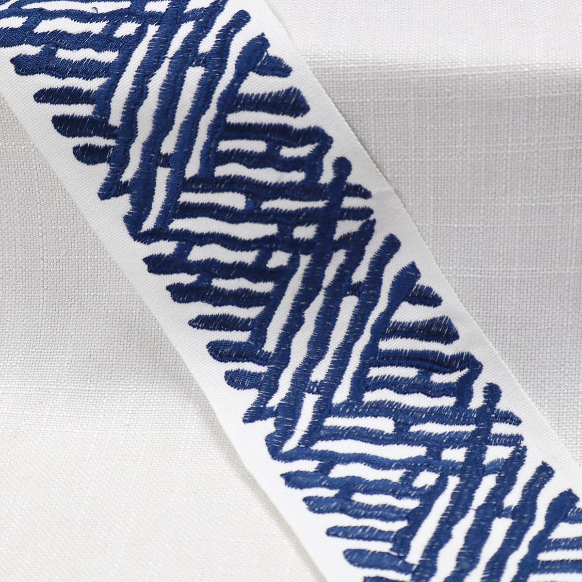 Eade’s TRELLI EMB TAPE MARINE MARINE