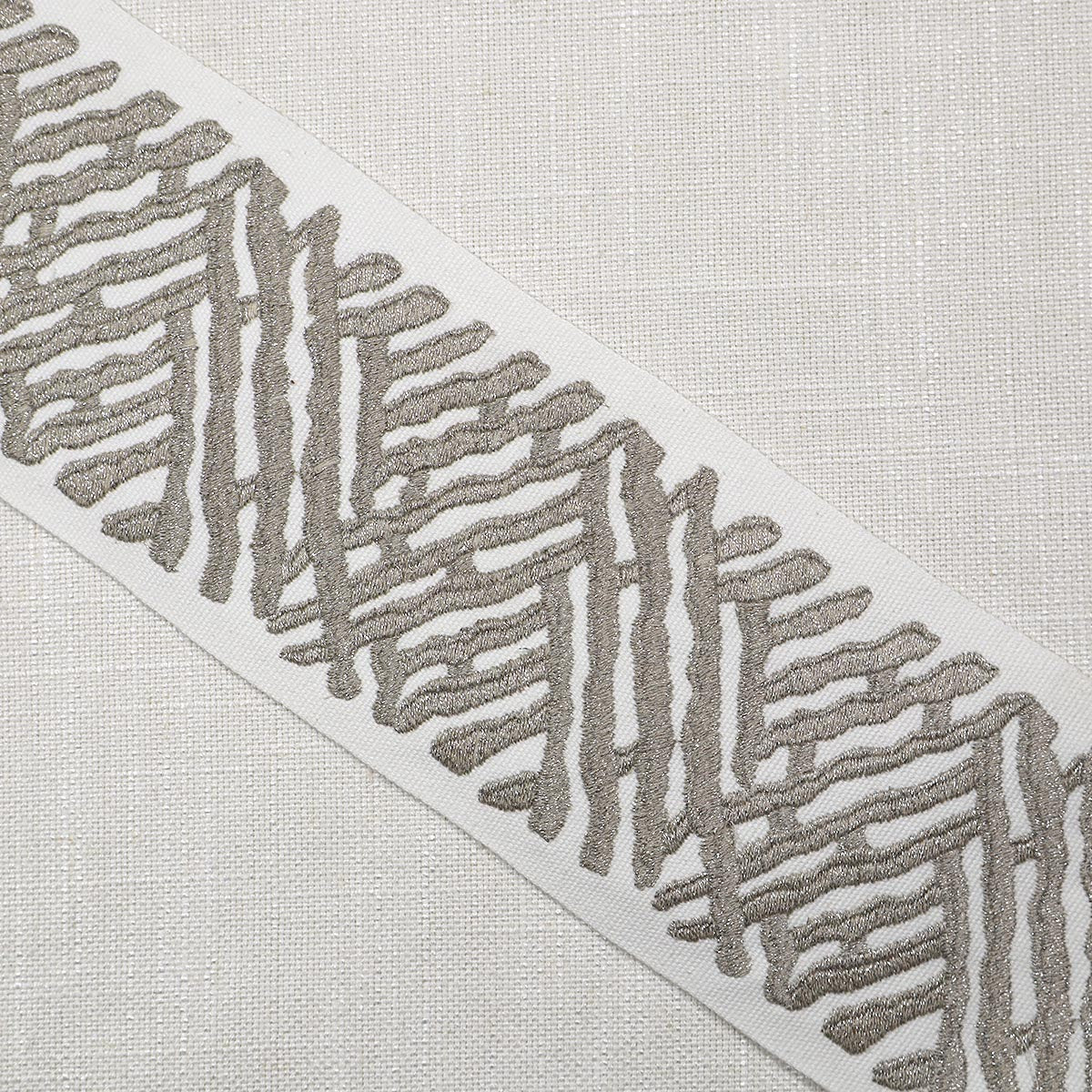 Eade’s TRELLI EMB TAPE PLATINUM PLATINUM