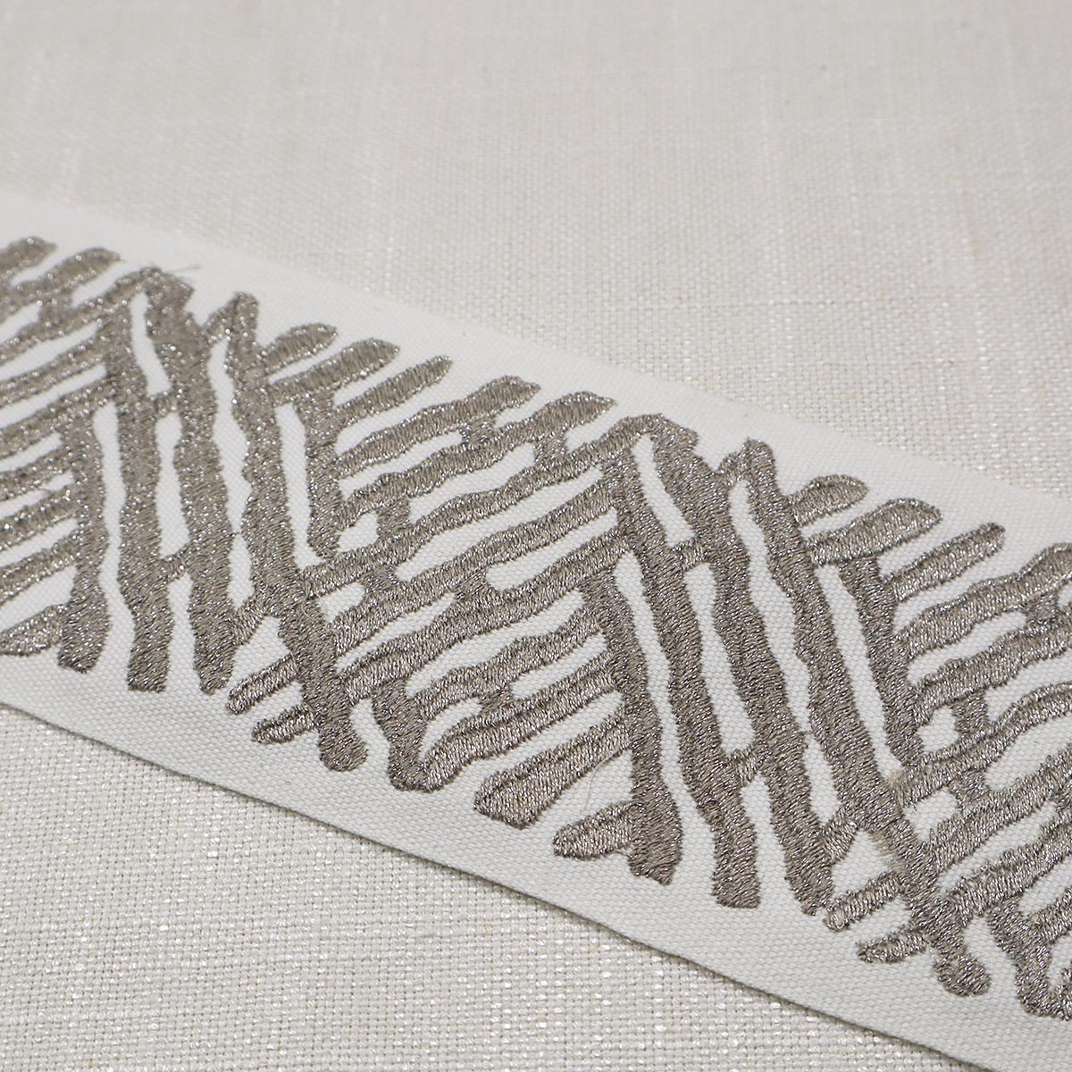 Eade’s TRELLI EMB TAPE PLATINUM PLATINUM