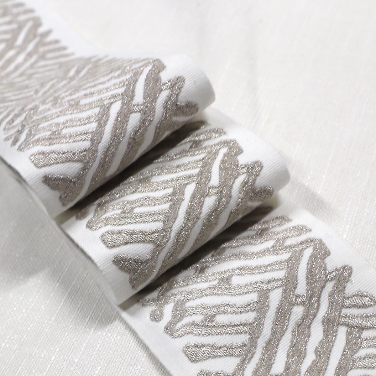 Eade’s TRELLI EMB TAPE PLATINUM PLATINUM