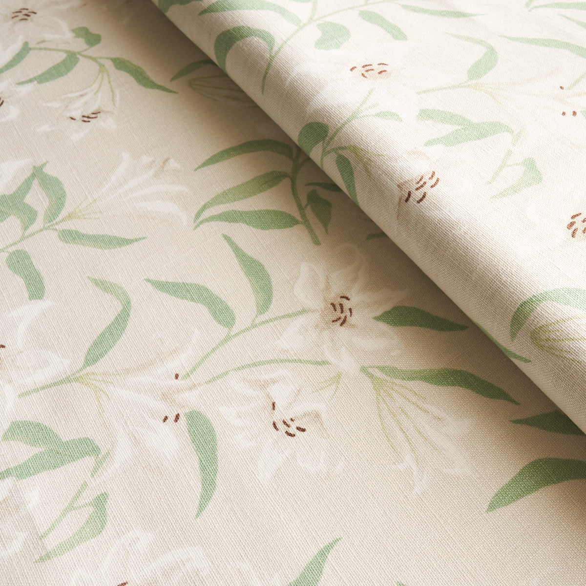 Schumacher Scattered Lilies Cream Fabric - Eade's Wallpaper
