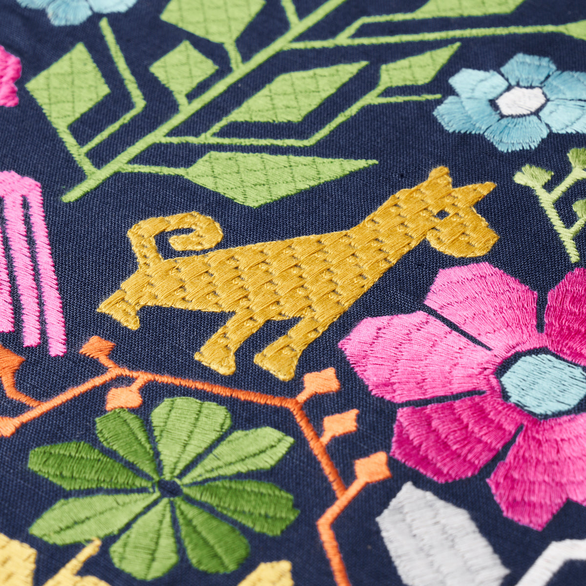 Schumacher Lupita Embroidery Multi On Navy Fabric - Eade's Wallpaper