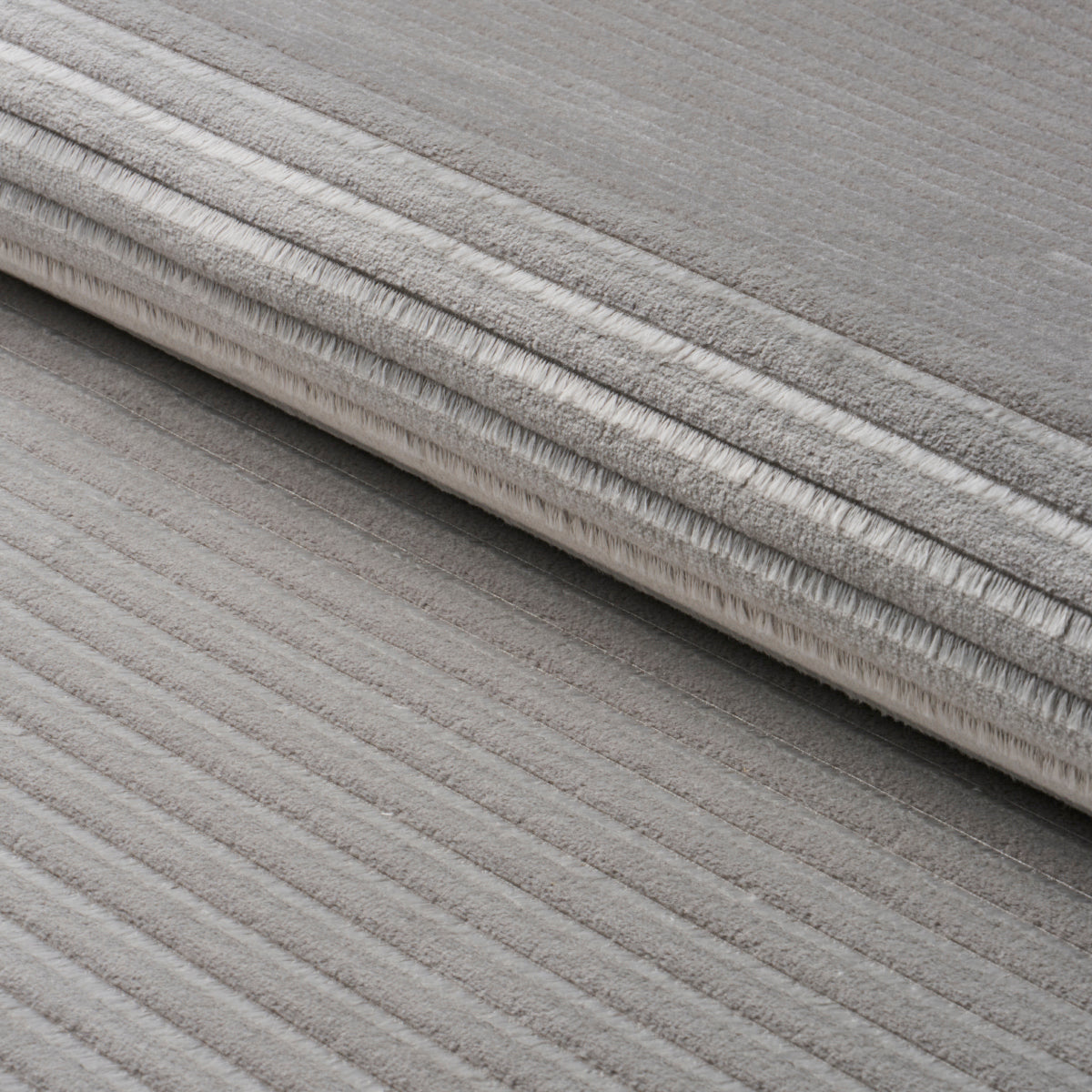 Schumacher Petite Channeled Velvet Otter Grey Fabric - Eade's Wallpaper