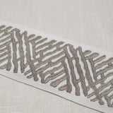 Eade’s TRELLI EMB TAPE PLATINUM PLATINUM