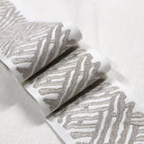 Eade’s TRELLI EMB TAPE PLATINUM PLATINUM